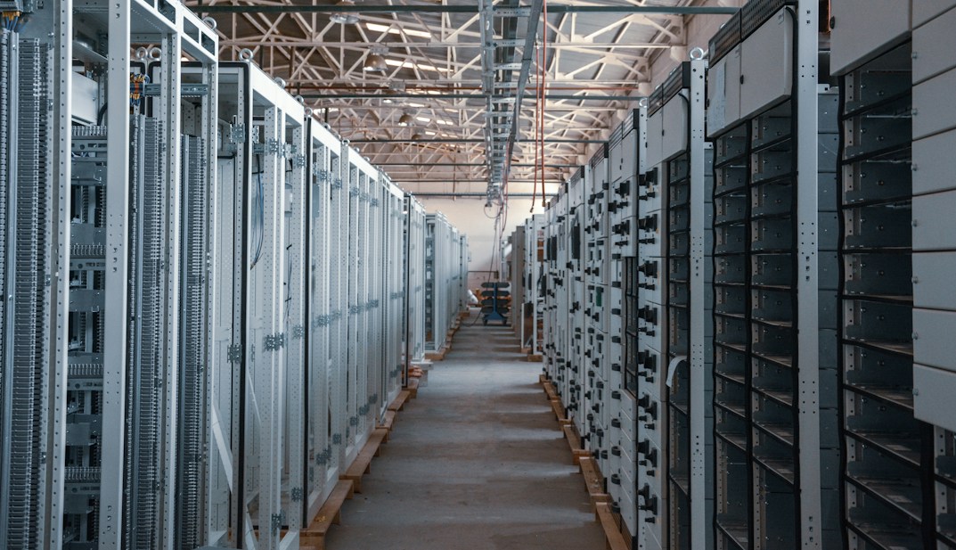 Server room corridor with racks on both sides