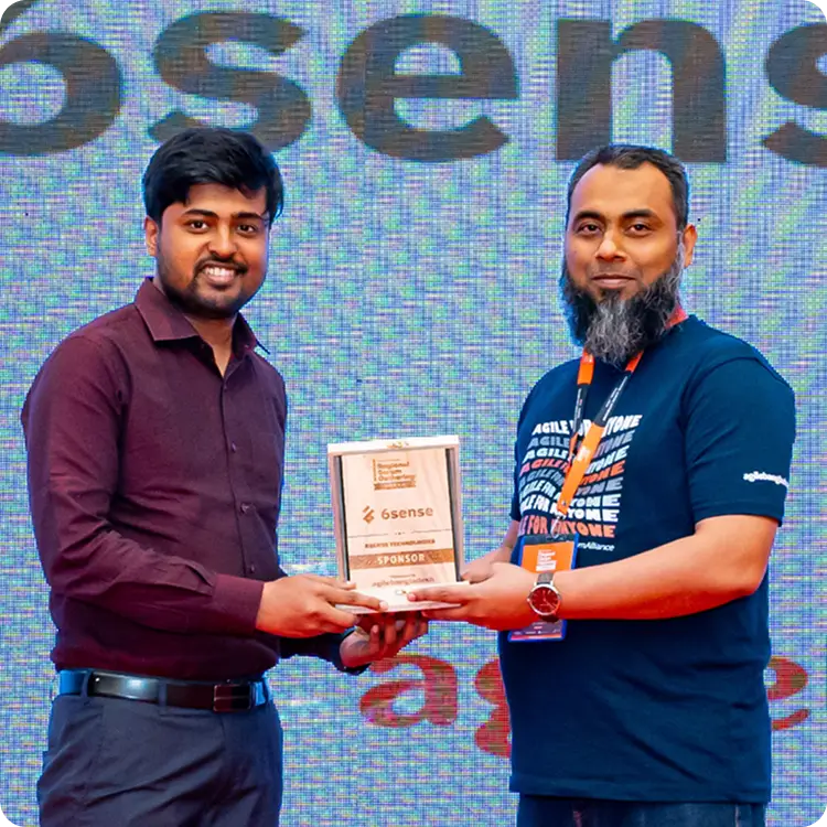 6sense HQ team receiving a sponsor award at an agile conference